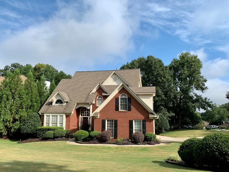 Why Exterior House Washing on the Emerald Coast Is a Year-Round Priority